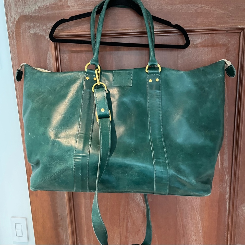 Gently used sseko leather carry all travel tote in agave.